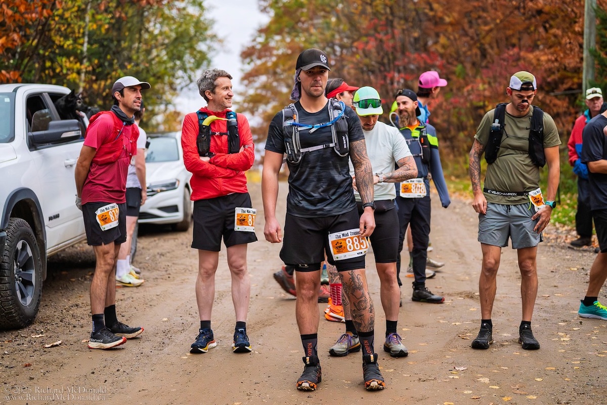 Trail runners preparing together at a Mad Trapper race